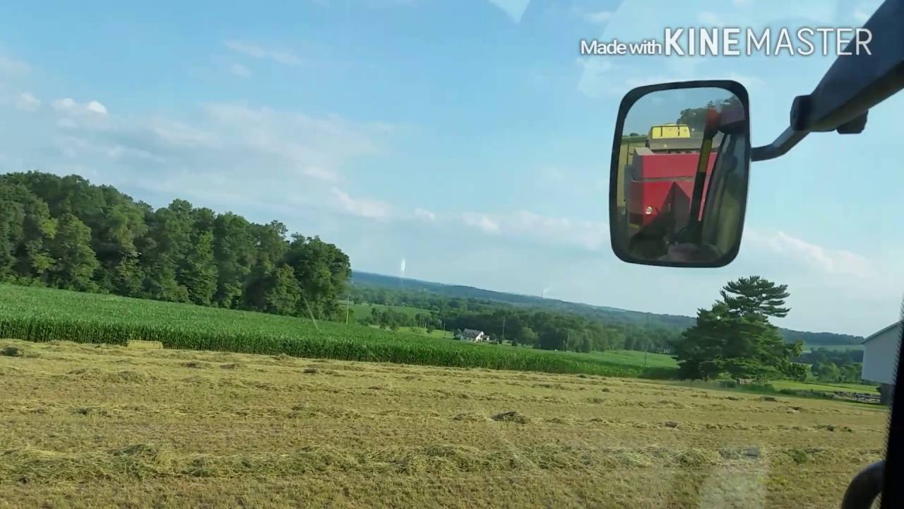 Custom baling with the Case MX255 and New Holland BB940A square baler