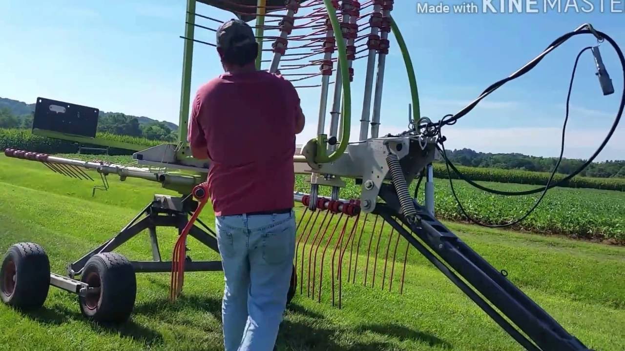 Cutting tedding raking and getting ready to bale or grass hay and 4th