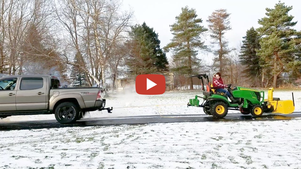 John Deere 1025R Tug of War against Toyota Just for fun