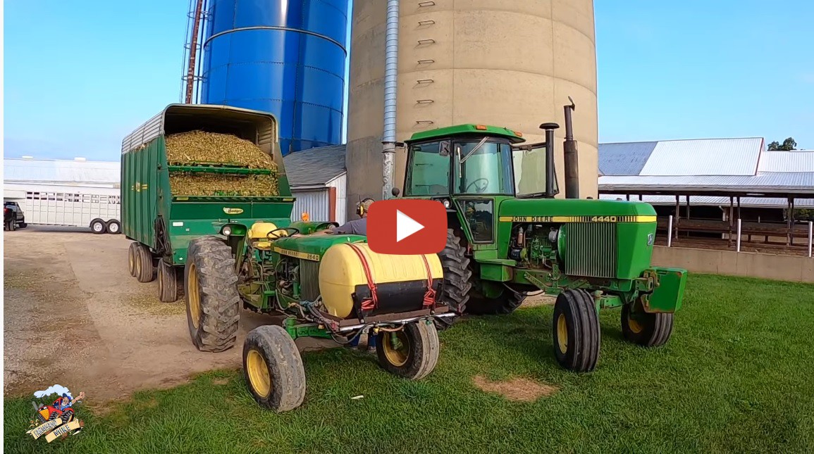 Winner Meat Farms west of Greenville Ohio as they chop corn silage and fill a silo.. John Deere