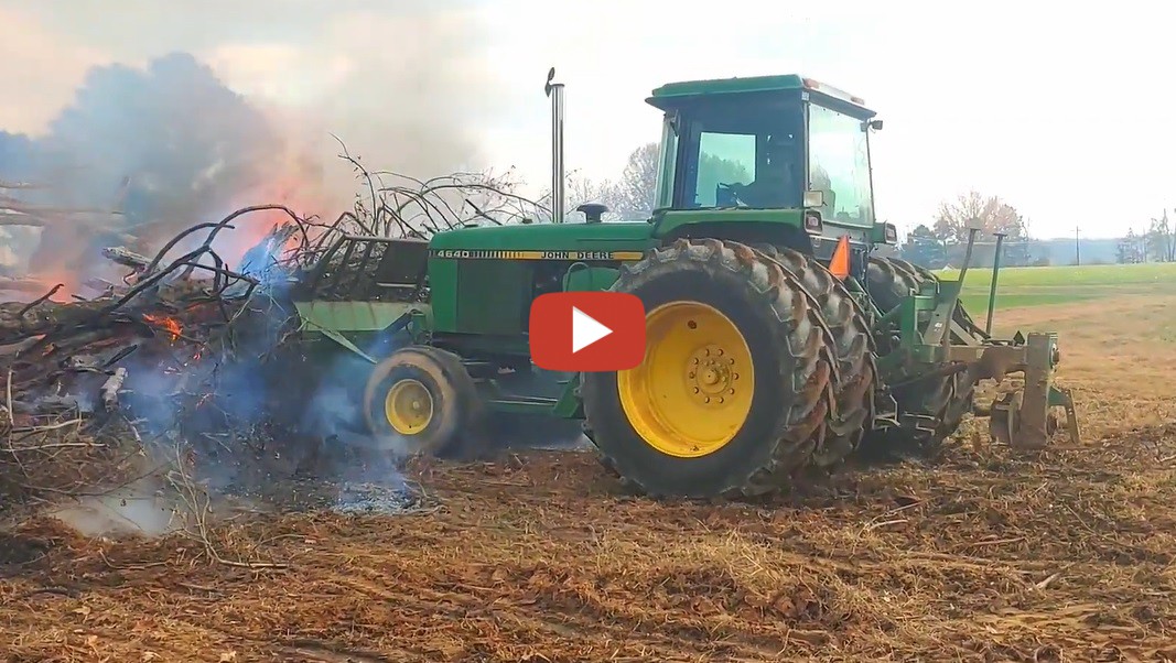 Playin" with Fire! We use our John Deere 4640 and dozer blade to help