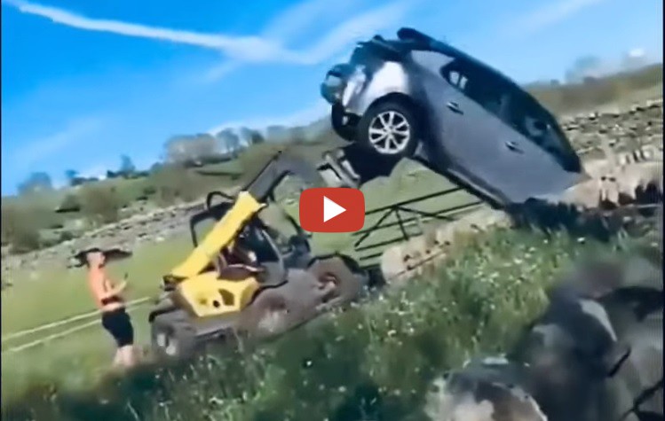 farmer tips car over