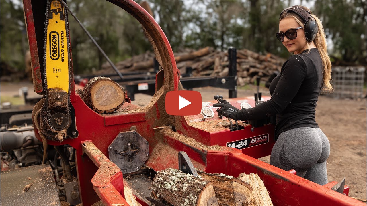 Zoe is splitting some oak wood on the Brute Force 1424 Firewood Processor.